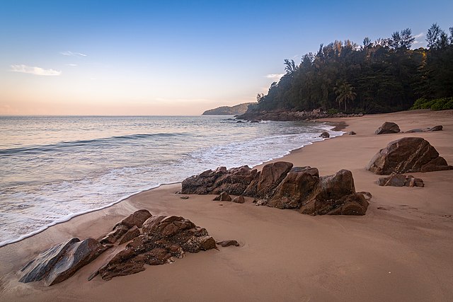 Nestled away on the northwest coast of Phuket, Thailand, Banana Beach is a hidden gem that beckons travelers seeking an untouched and tranquil escape. 