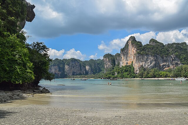 Railay Beach with its stunning limestone cliffs world class rock climbing Vibrant local culture and pristine beaches It is a beautiful paradise on the Andaman coast of Thailand