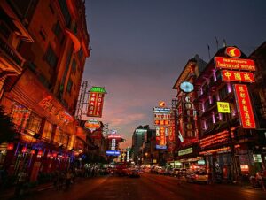 Yaowarat: Explore Bangkok's lively Chinatown. bustling market and the enticing aroma of street food floating in the air