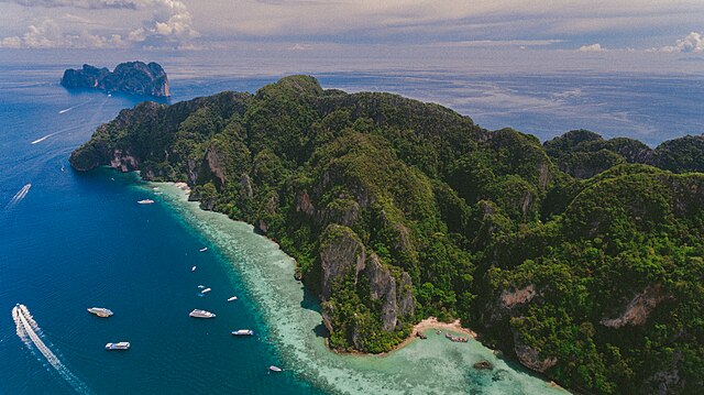 Explore the stunning beauty and serene ambiance of the Phi Phi Islands in Krabi Province, Thailand. Discover pristine beaches, crystal-clear waters, and a plethora of recreational activities that promise an unforgettable tropical getaway.