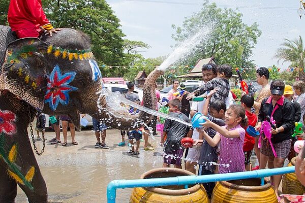 Songkran Festival, Thai New Year, Thailand, water festival, cultural traditions, religious rituals, community celebration, purification, renewal, water fights, street festivities, Buddhist customs, Thai culture, traditional food, sand pagodas, eco-friendly initiatives